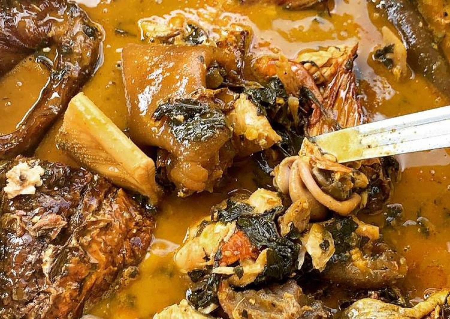 2 LITER OF BITTER LEAF SOUP WITH DRY FISH AND COW TAIL