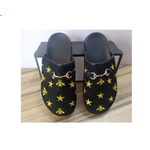 Les créateurs Rhegzor couvrent les chaussons palmiers Noir